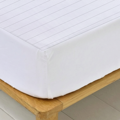 grounding sheet showing the width size of30cm 100% cotton skirt on top of a bed