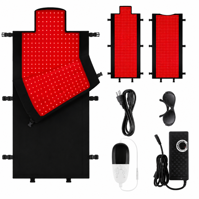 Full body infrared therapy mat and accessories, power cable, remote control, power adapter, glasses on a white background