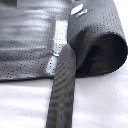 Grounding sheet with elastic in detail showing the textured surface of the UP Leather material on a white background