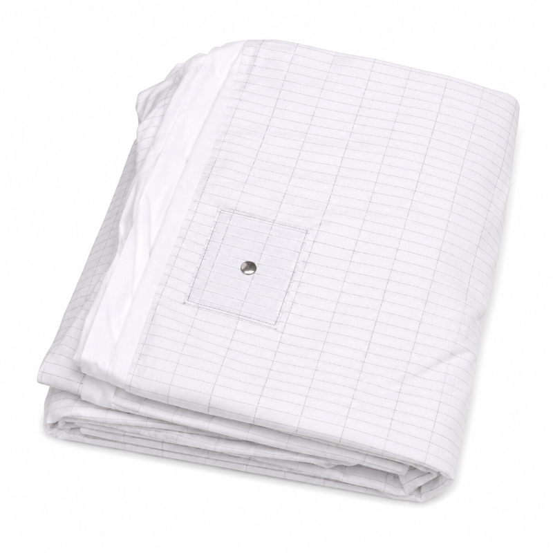 A folded whitegrounding sheet and a small metal snap button on the corner, shown on a clean white background.